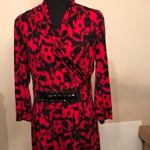 Red and blackV neck dress. Attached belt